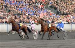 Åttaårige Oyonnax och Sebastien Ernault delade ut över 173 gånger pengarna i vinnarodds. Ett rekord för loppet. Foto: Lars Jakobsson