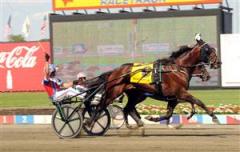 Muscle Massive och Ron Pierce vinner Hambletonian 2010. Foto: Lars Jakobsson